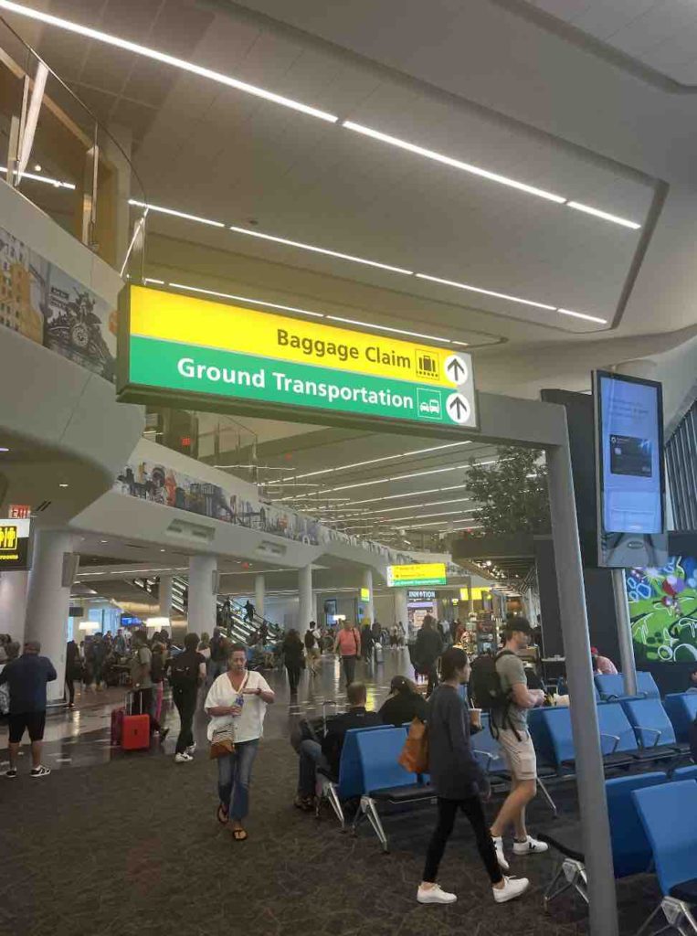 Keep following Baggage Claim and Ground Transportation Signs at LaGuardia Airport Terminal B.