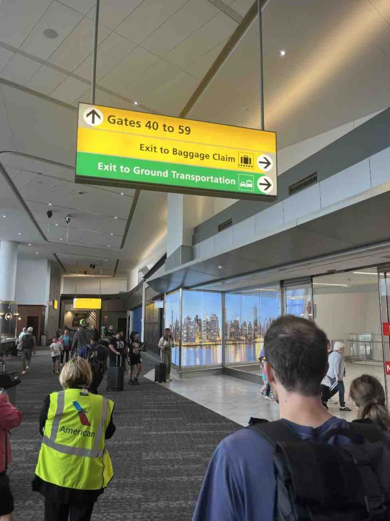 Keep following Baggage Claim and Ground Transportation Signs at LaGuardia Airport Terminal B.