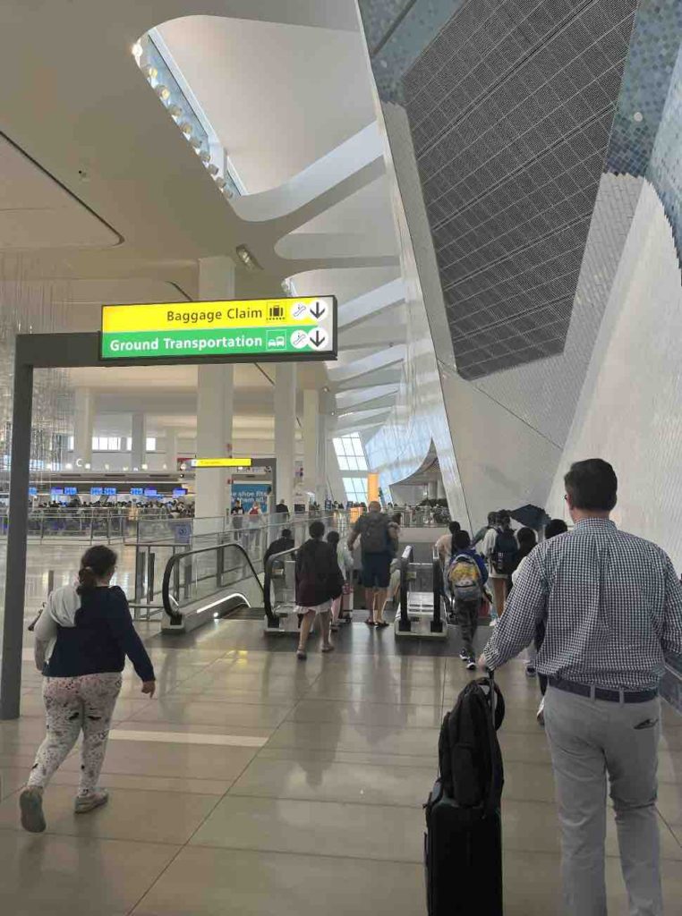 Keep following Baggage Claim and Ground Transportation Signs at LaGuardia Airport Terminal B.