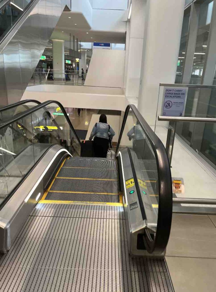 Go down the escalator